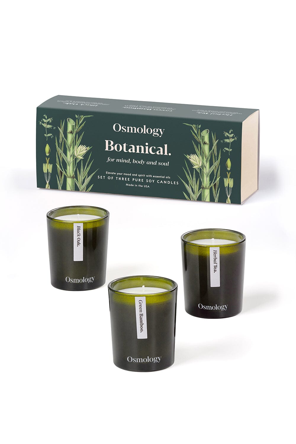 Osmology Botanical gift set, with three votive candles that include Black Oak, Green Bamboo & Herbal Tea, on white background