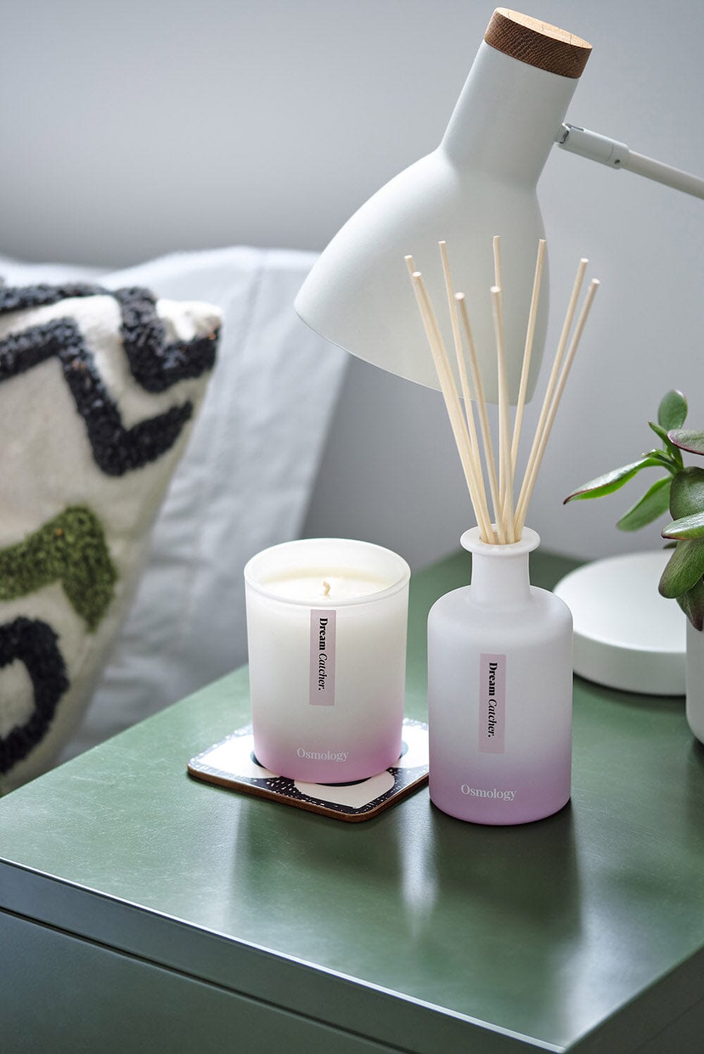 Dream Catcher candle and diffuser placed on bedside table