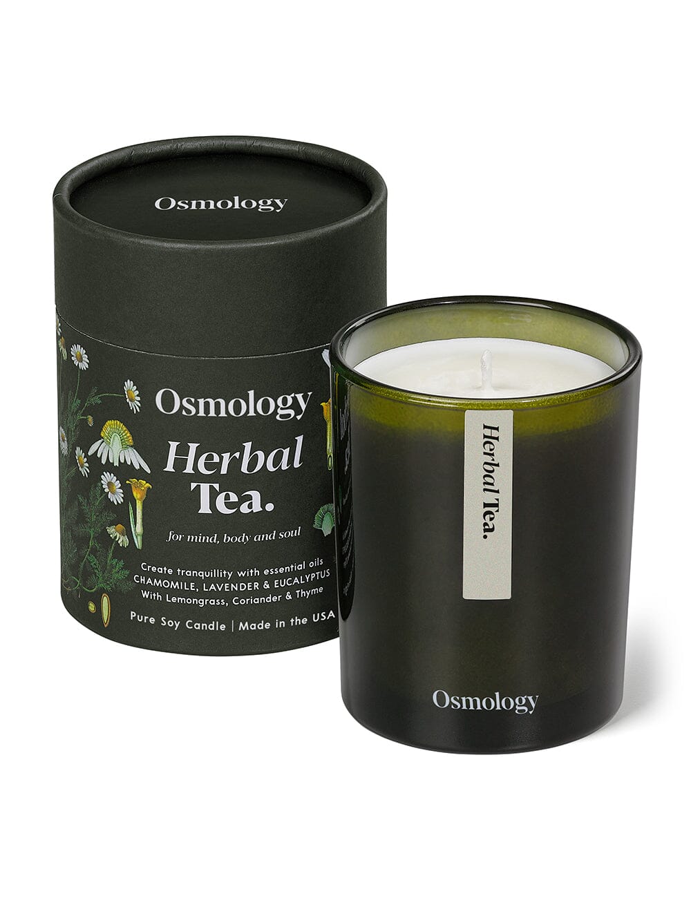 Osmology Herbal Tea candle displayed next to product packaging