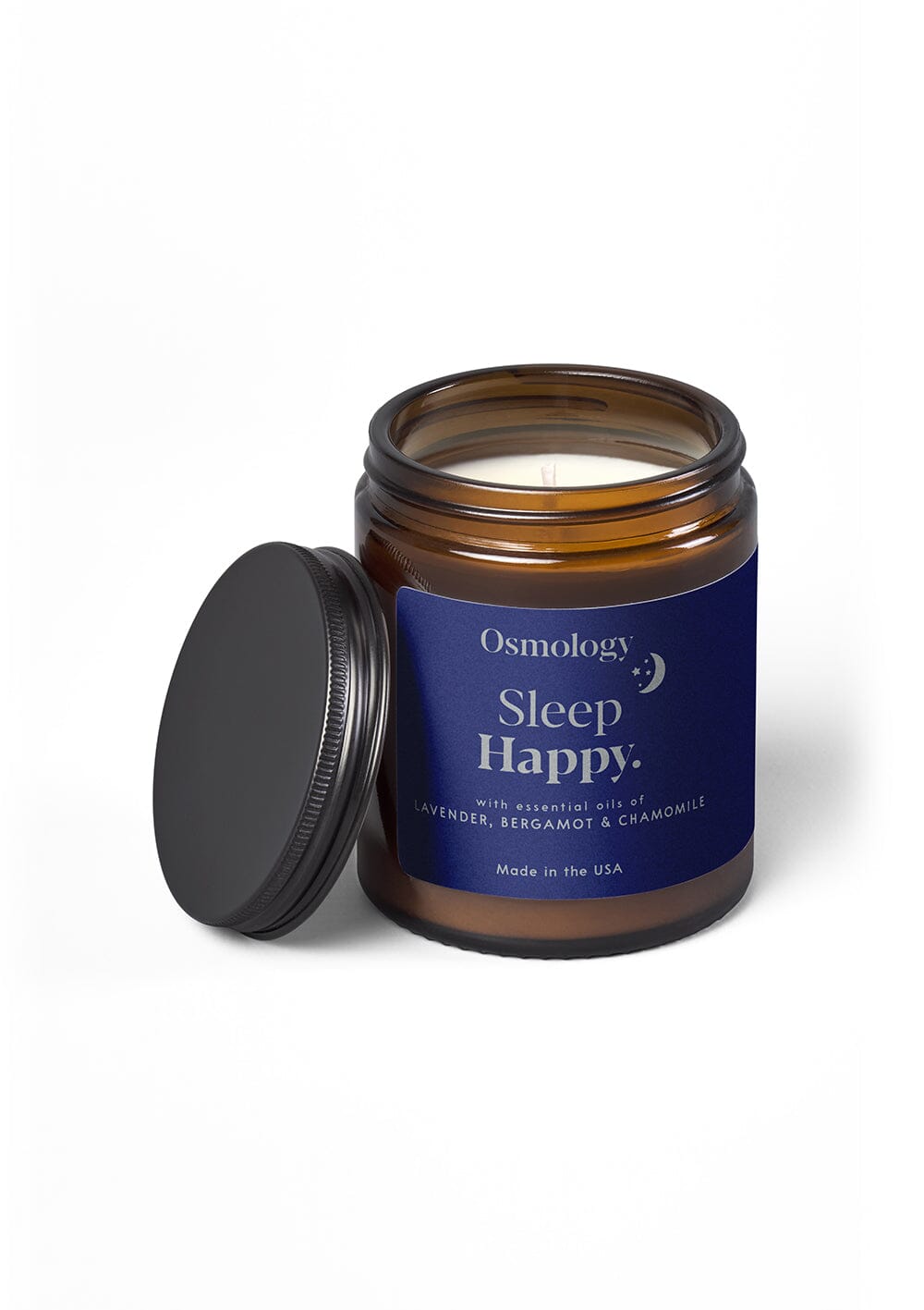 Osmology Sleep Happy jar candle with open lid on white background